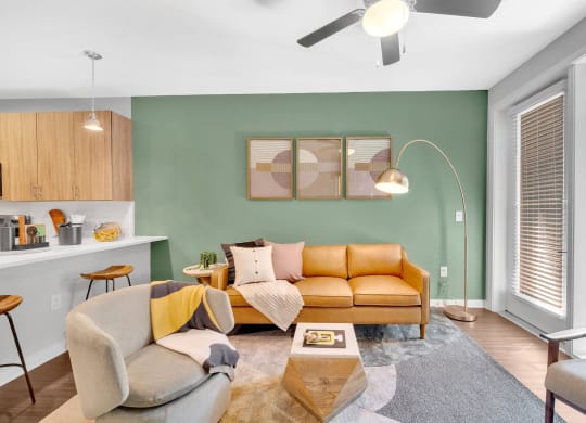a living room with a couch and a table
