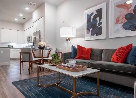 a living room with a couch and a table