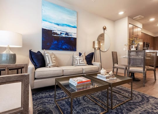 a living room with a couch and a table