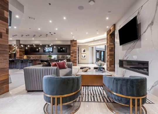a living room with a fireplace and a television