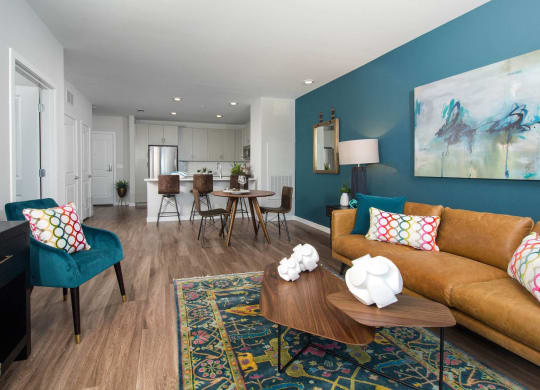 a living room with a couch and a table
