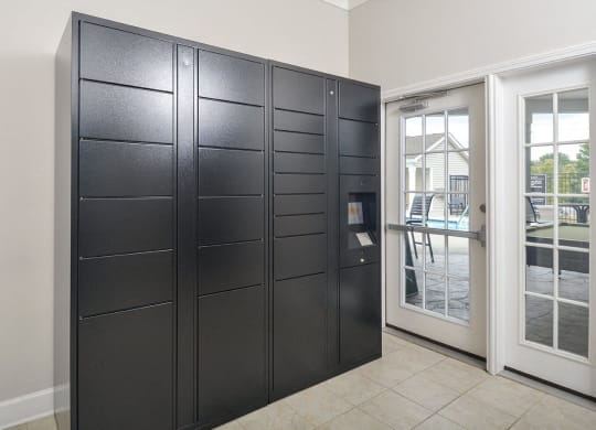 a room with a closet and a door to a patio