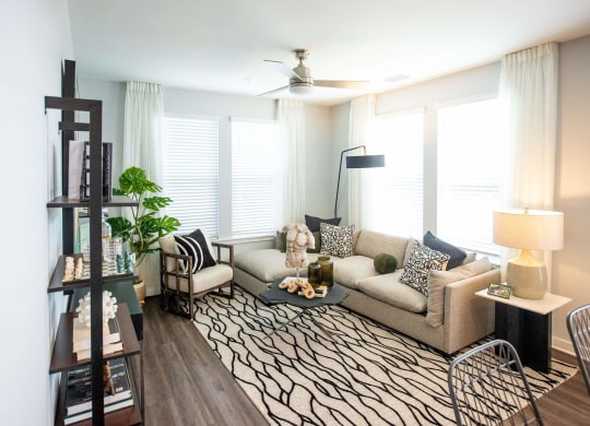 a living room with a couch and a chair