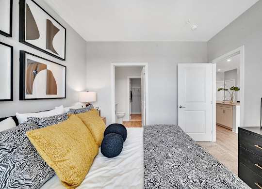a bedroom with a bed and a closet