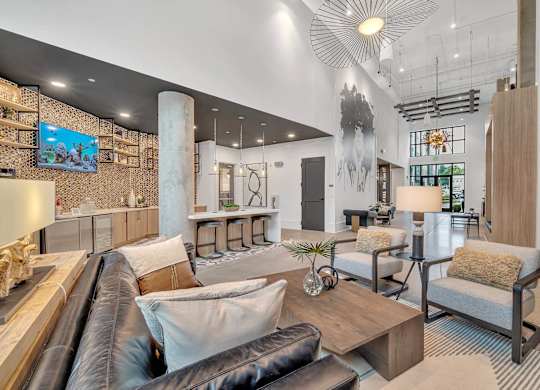 a living room with a couch and a table