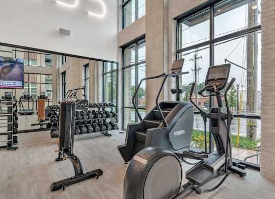 the gym at the flats at big tex apartments