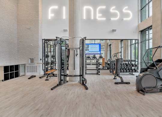 the gym at the flats at big tex apartments
