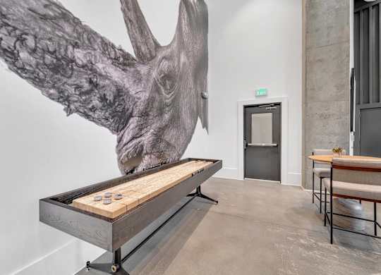 a foosball table in a room with a large