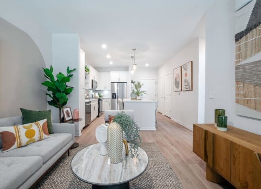 a living room with a couch and a table