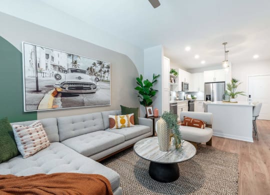 a living room with a couch and a table