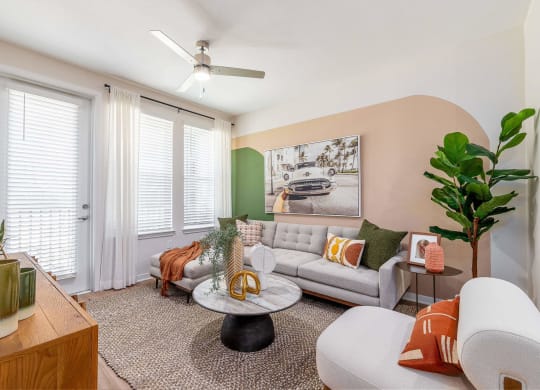 a living room with a couch and a table