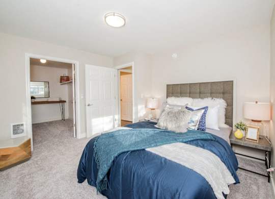 Bedroom with a large bed at The Arden, Gresham
