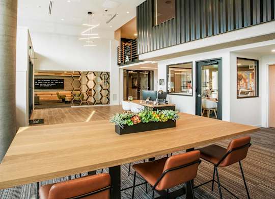 A conference room with a long table and chairs.at Axle, Washington, 98119