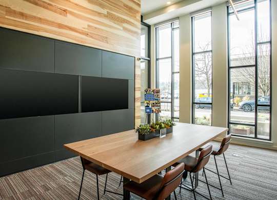 A conference room with a long table and chairs.at Axle, Seattle, WA 98119 
