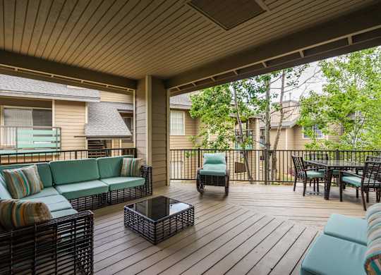A Wooden Deck With a Sofa at The Summit at Flagstaff, Flagstaff, AZ, 86004