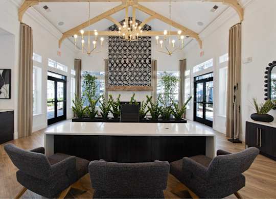 the lobby with a reception desk and chairs