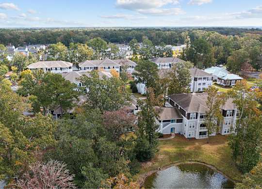 an aerial view of a neighborhood with houses and trees