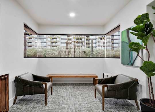 a room with two chairs and a table