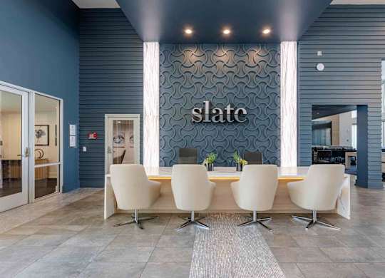 slate scottsdale leasing office with large table and chairs
