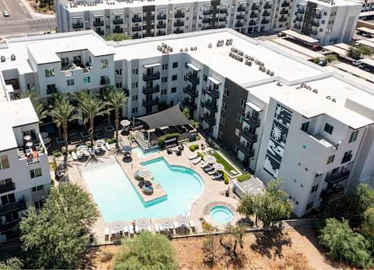 a view of the courtyard and pool at slate apartments in arizona