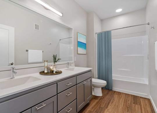modern bathroom with soaking tub at The Hallon Apartments, Hopkins MN, 55343