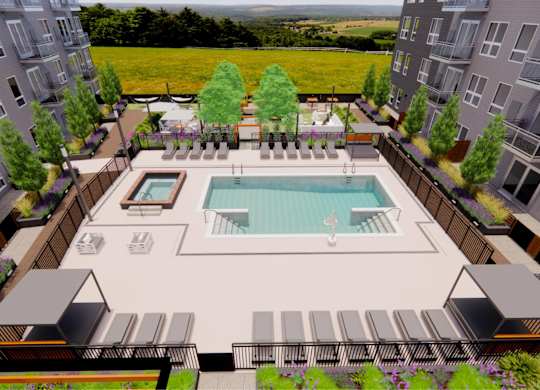 an aerial view of an apartment complex with a swimming pool