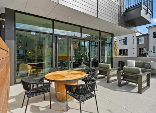 A patio with a table and chairs is shown.