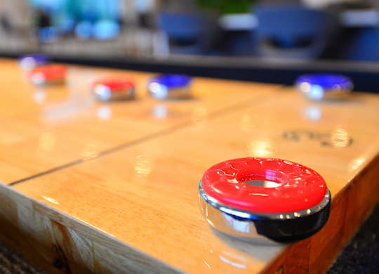 Shuffle Board Table  at The Pacifica Apartments, Tacoma, WA, 98409