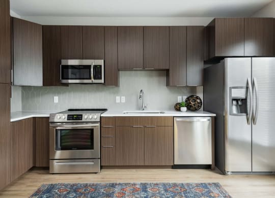 Cabinet pace and stainless steel appliances at PARK40, Broomfield, Colorado