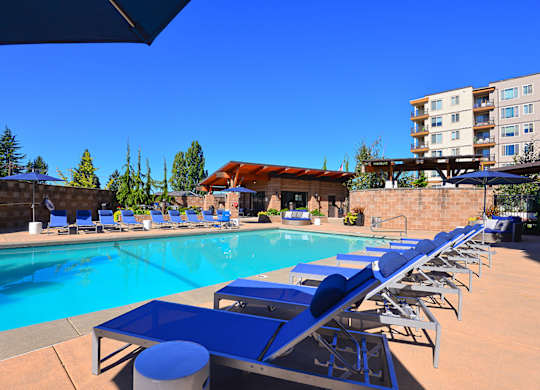 Swimming Pool With Relaxing Sundecks at The Pacifica Apartments, Tacoma, Washington