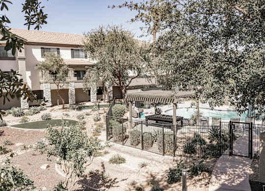 Lush community with beautiful landscape and sparkling community pool