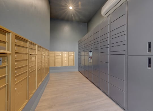 a bunch of lockers in a room with wood floors