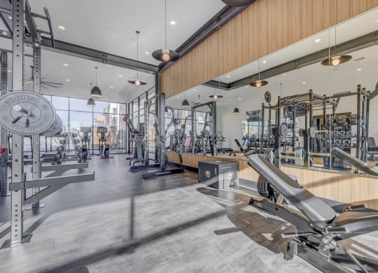 a gym with weights machines and other exercise equipment
