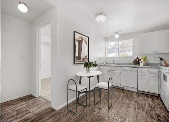 Kitchen with table and chair at The Pointe at Northridge, Utah