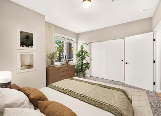 A bedroom with a bed, a dresser, and a window.