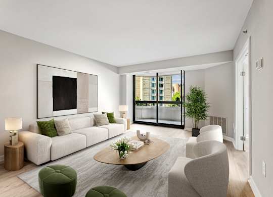 a living room with a white couch and a table    and a balcony
