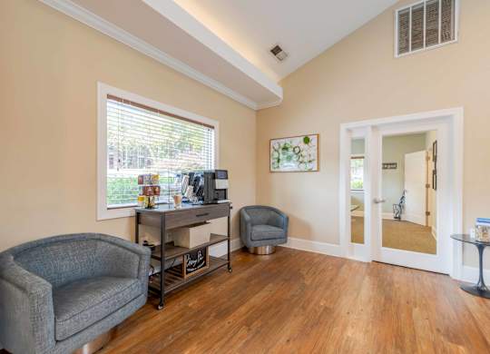 coffee maker and seating area in the clubhouse