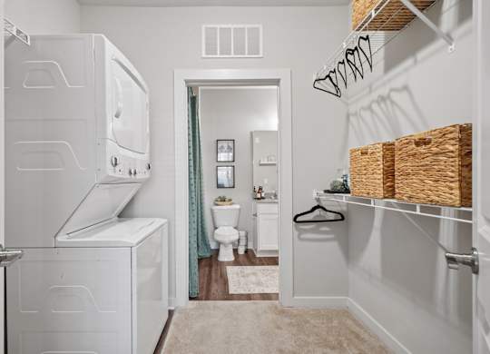 A laundry room with a washer and dryer.