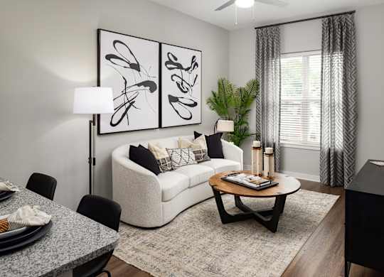a living room with a couch and a table