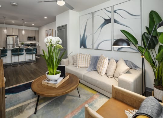 a living room with a couch and a table
