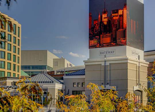 A building with a large advertisement on the side of it.