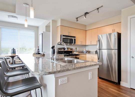 Gourmet Kitchen With Island at The Pacifica Apartments, Tacoma, WA, 98409