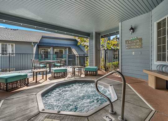 Inviting community spa featuring a large hot tub.