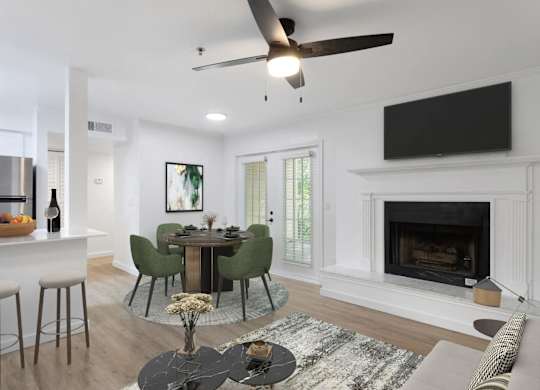 A modern living room with a fireplace and a dining table set up.