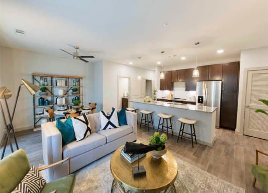 a view of a living room with a bar and a surfboard