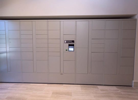 a large white wall with a machine on it