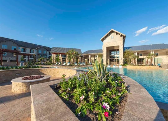 a swimming pool with a building in the background