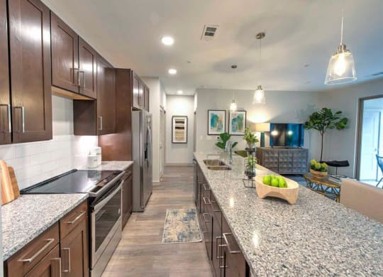 a kitchen with a long counter top and a large