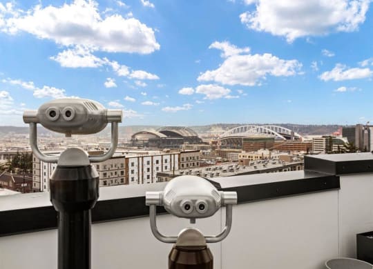 a pair of surveillance cameras on a roof