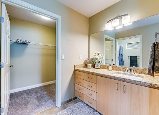 The Residences at Stone Creek in Milton, Washington Model Bathroom with Walk-In Closet